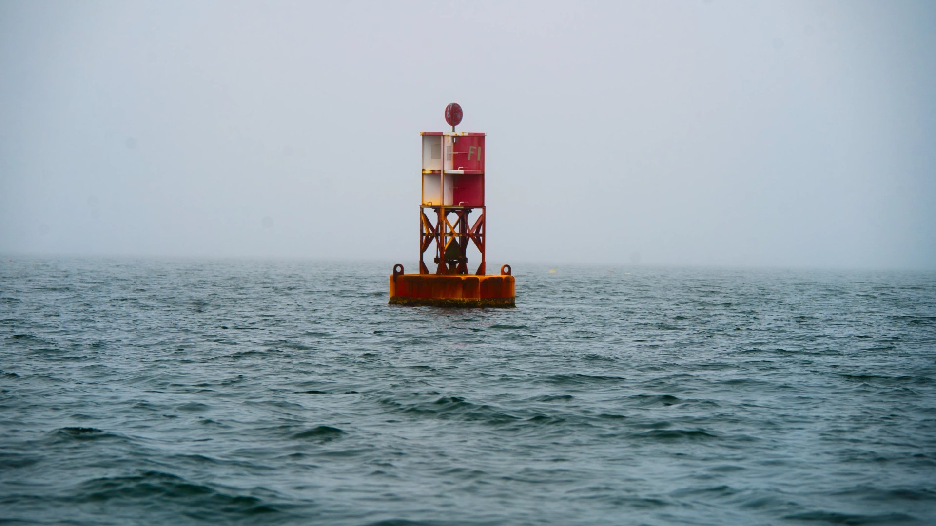 Stormy sea lonely buoys in Maine